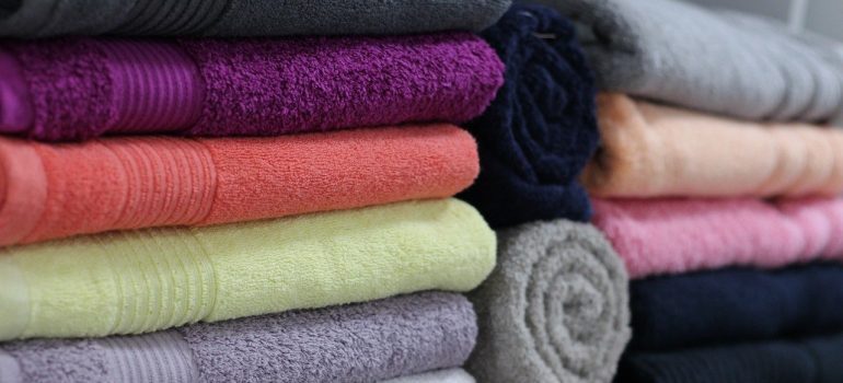 A stack of colorful towels to pack in the right order.